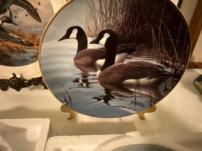 Ducks unlimited signed plates with Knowles plates, and art work