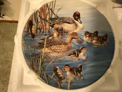 Ducks unlimited signed plates with Knowles plates, and art work