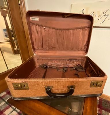 Vintage suitcase, hats, portrait picture, hardanger picture