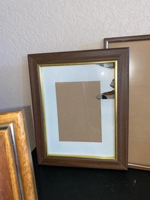 BRASS VASE, CANDLEHOLDER AND PICTURE FRAMES