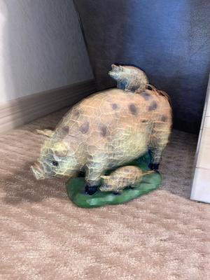 ARNOLD THE HAWG ON A CO-OP CUTTING BOARD AND BABY HAM HITCHING A RIDE ON MAMA PIG