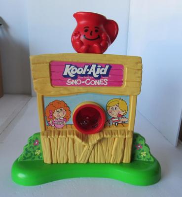 Older Kid's Kool Aid Maker and Fisher Price Toys