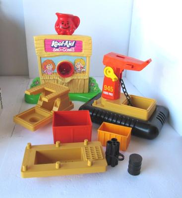 Older Kid's Kool Aid Maker and Fisher Price Toys