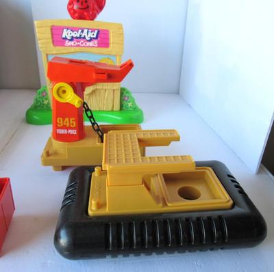 Older Kid's Kool Aid Maker and Fisher Price Toys
