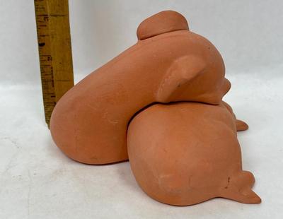 Terra Cotta Pigs - Sleeping on top of each other