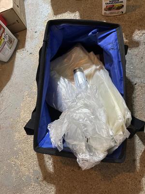 Plastic sheeting and blue bag