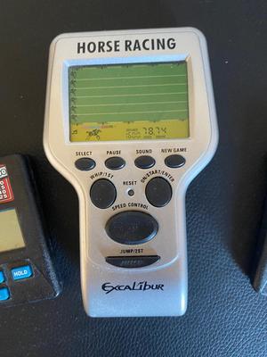 HANDHELD VIDEO POKER AND HORSE RACING
