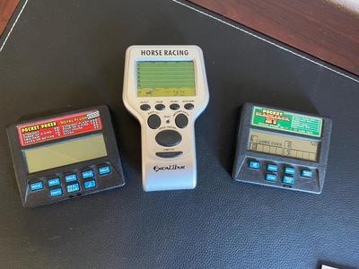 HANDHELD VIDEO POKER AND HORSE RACING