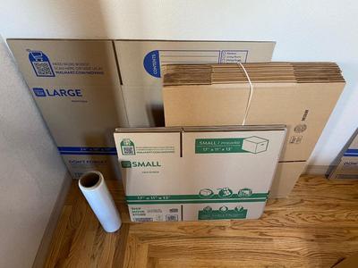 MOVING BOXES AND SHRINK WRAP