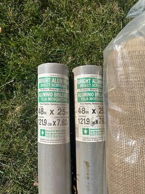 Trash bin, bug netting, and burlap