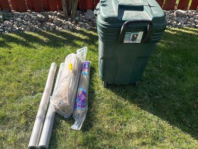 Trash bin, bug netting, and burlap