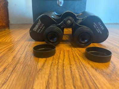2 PAI OF VINTAGE TASCO BINOCULARS