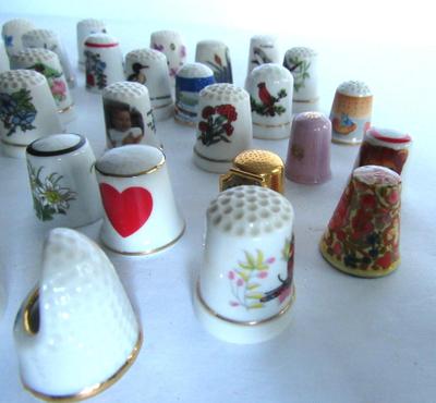 Large Lot Porcelain and Other Thimbles, Little Fabric Flowers, Curled Needles