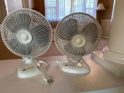 Two Westinghouse little fans