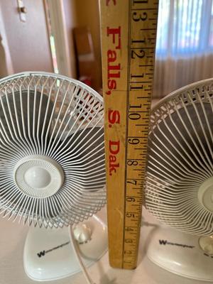 Two Westinghouse little fans