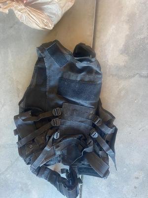 HUNTING/TACTICAL VEST AND A FEW DIFFERENT SETS OF HEARING PROTECTION