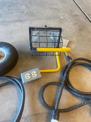 WORK LIGHT, 2 HEAV Y DUTY 9’ EXTENSION CORDS & A SPARE TIRE