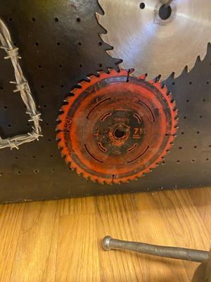 VISE, SAW BLADES, LICENSE PLATE ACCESSORY AND PEG BOARD