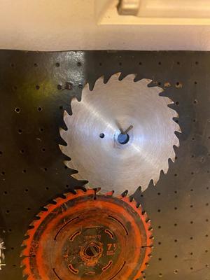 VISE, SAW BLADES, LICENSE PLATE ACCESSORY AND PEG BOARD