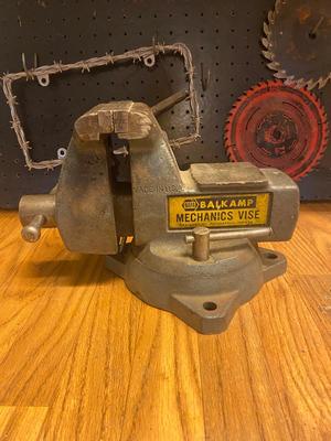 VISE, SAW BLADES, LICENSE PLATE ACCESSORY AND PEG BOARD