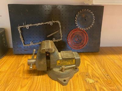 VISE, SAW BLADES, LICENSE PLATE ACCESSORY AND PEG BOARD