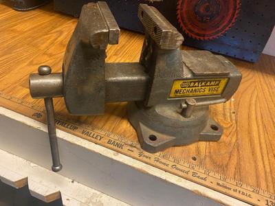 VISE, SAW BLADES, LICENSE PLATE ACCESSORY AND PEG BOARD