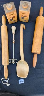 Kitchen wooden utensils, rolling pens, and salt. pepper