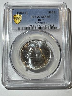 PCGS CERTIFIED ITALY 1984-R MS65 500 Lire Olympics Los Angeles Silver Coin KM-114 as Pictured.