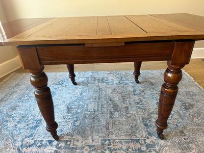 Antique Slide Out Leaves Dining Table