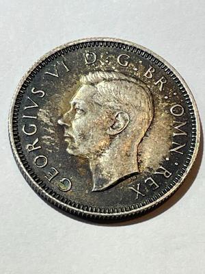 Great Britain 1942 Au Condition Toned One Shilling Silver Coin as Pictured.