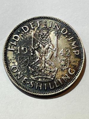 Great Britain 1942 Au Condition Toned One Shilling Silver Coin as Pictured.