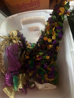 Three Bins of Mardi Gras Decoration