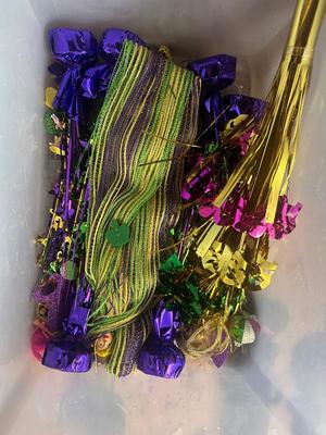 Three Bins of Mardi Gras Decoration