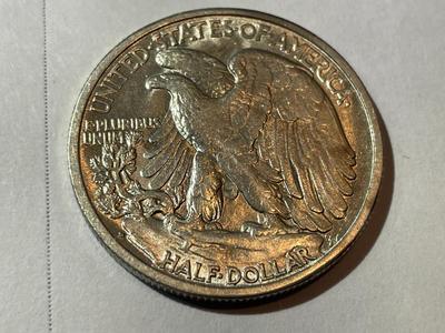 1941-S AU CONDITION WALKING LIBERTY SILVER HALF DOLLAR AS PICTURED.