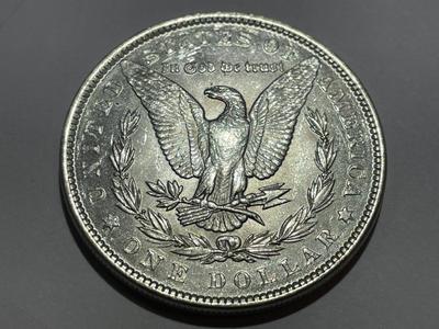 1889-P UNCIRCULATED CONDITION MORGAN SILVER DOLLAR AS PICTURED.