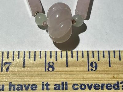 Vintage 29" Rose Quartz Beaded Necklace w/Large Carved Rose Quartz Dividers Pendant in VG Preowned Condition as Pictured.