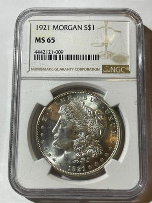 NGC CERTIFIED 1921-P MS65 GRADED MORGAN SILVER DOLLAR.