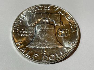 1963-D UNCIRCULATED CONDITION FRANKLIN SILVER HALF DOLLAR AS PICTURED.