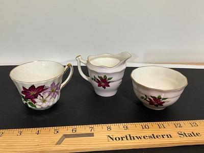 Teacup, pitcher and sugar bowl