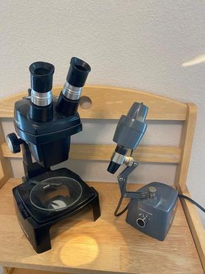 BOUSCH & LOMB MICROSCOPE WITH EXTERNAL LIGHT , ELECTRICAL ISOLATOR, AND EXTERNAL EXTENSION CORD