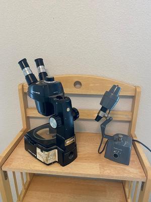 BOUSCH & LOMB MICROSCOPE WITH EXTERNAL LIGHT , ELECTRICAL ISOLATOR, AND EXTERNAL EXTENSION CORD
