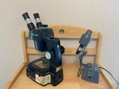 BOUSCH & LOMB MICROSCOPE WITH EXTERNAL LIGHT , ELECTRICAL ISOLATOR, AND EXTERNAL EXTENSION CORD