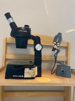 BOUSCH & LOMB MICROSCOPE WITH EXTERNAL LIGHT , ELECTRICAL ISOLATOR, AND EXTERNAL EXTENSION CORD