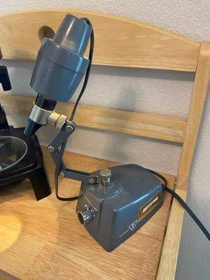 BOUSCH & LOMB MICROSCOPE WITH EXTERNAL LIGHT , ELECTRICAL ISOLATOR, AND EXTERNAL EXTENSION CORD