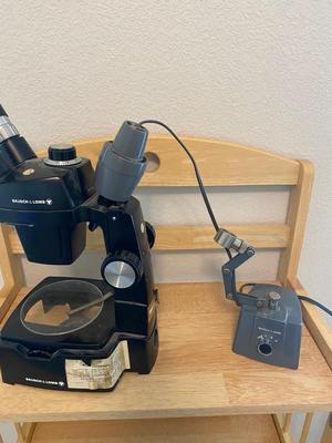 BOUSCH & LOMB MICROSCOPE WITH EXTERNAL LIGHT , ELECTRICAL ISOLATOR, AND EXTERNAL EXTENSION CORD