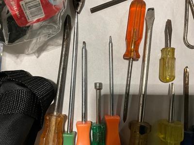 Combination of screw drivers, wrenches