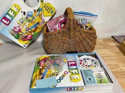 Kids basket of goodies with The Game of Life
