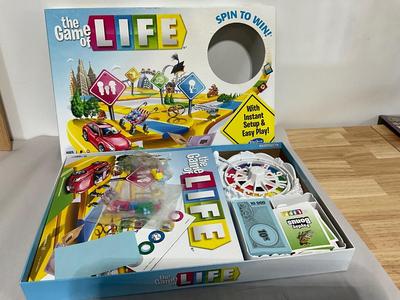 Kids basket of goodies with The Game of Life