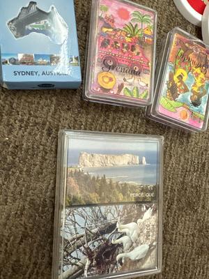 Lot of playing cards and coasters