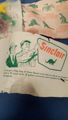 LOT 177 TWO OLD SINCLAIR PACKS OF DINASOR